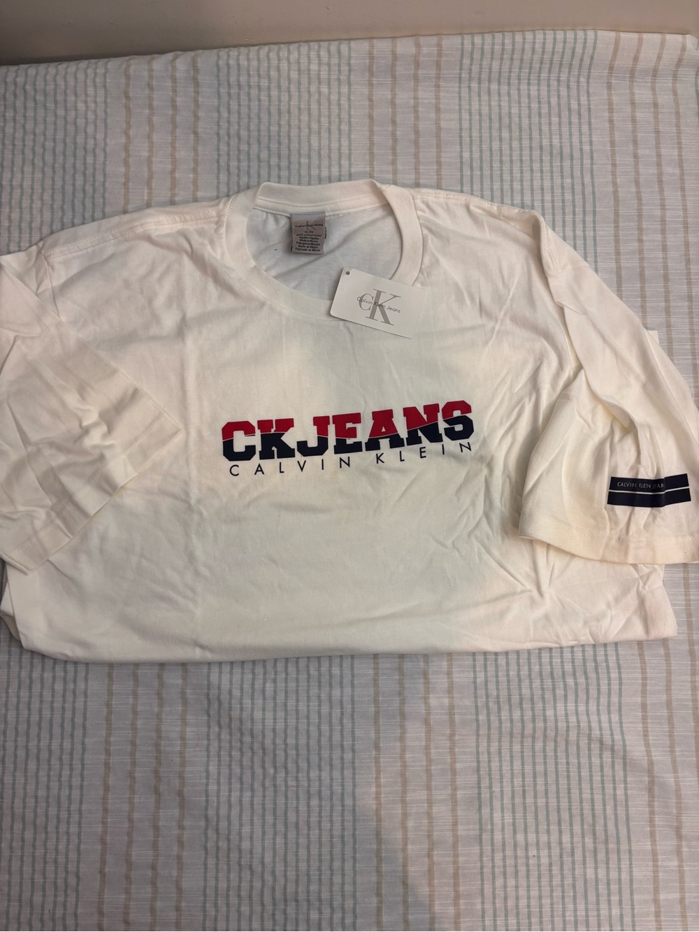 Calvin Klein Jeans White Short Sleeve Tee with Red & Navy Logo